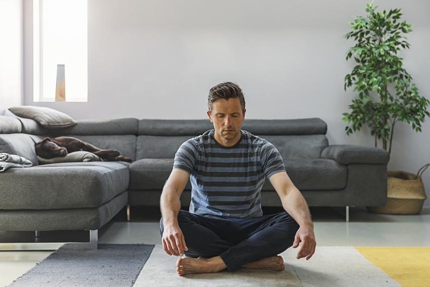 Man meditating to reduce stress