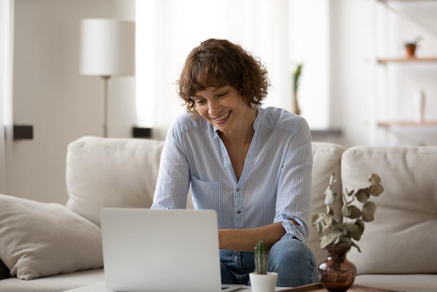 Person attending a virtual therapy session using her laptop for an article on how to make the most of every appointment